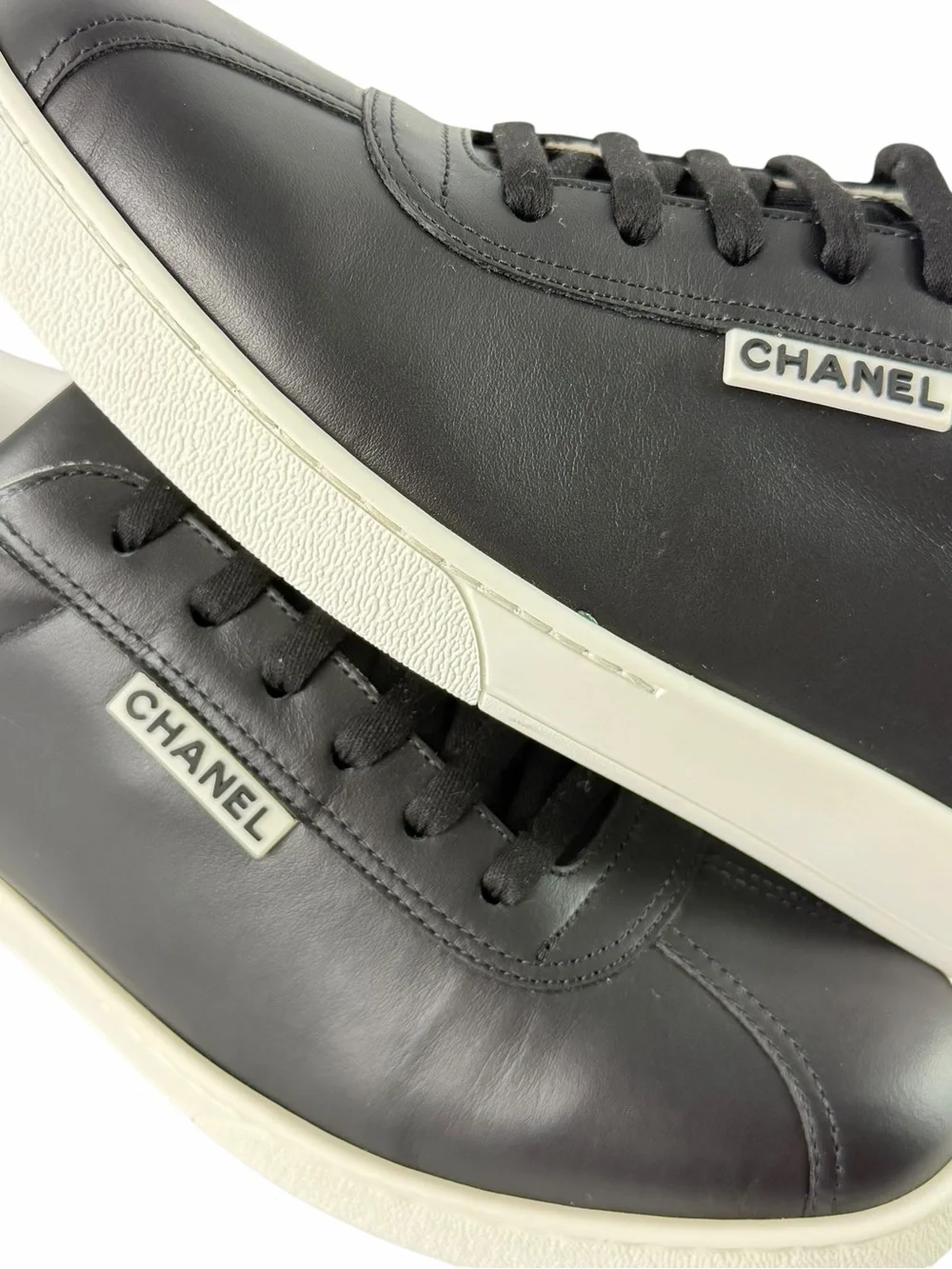 CHANEL Uniform Black Leather Low Top Unisex Sneakers Marked as 42 - W 11 - M 9